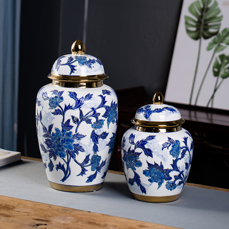 The minimum order quantity for ceramic ornaments is 12 sets. They are large-sized Chinese-style living room and office general jars, featuring real gold enameled flower technique, gold and hand-painted blue and white porcelain vases details Picture