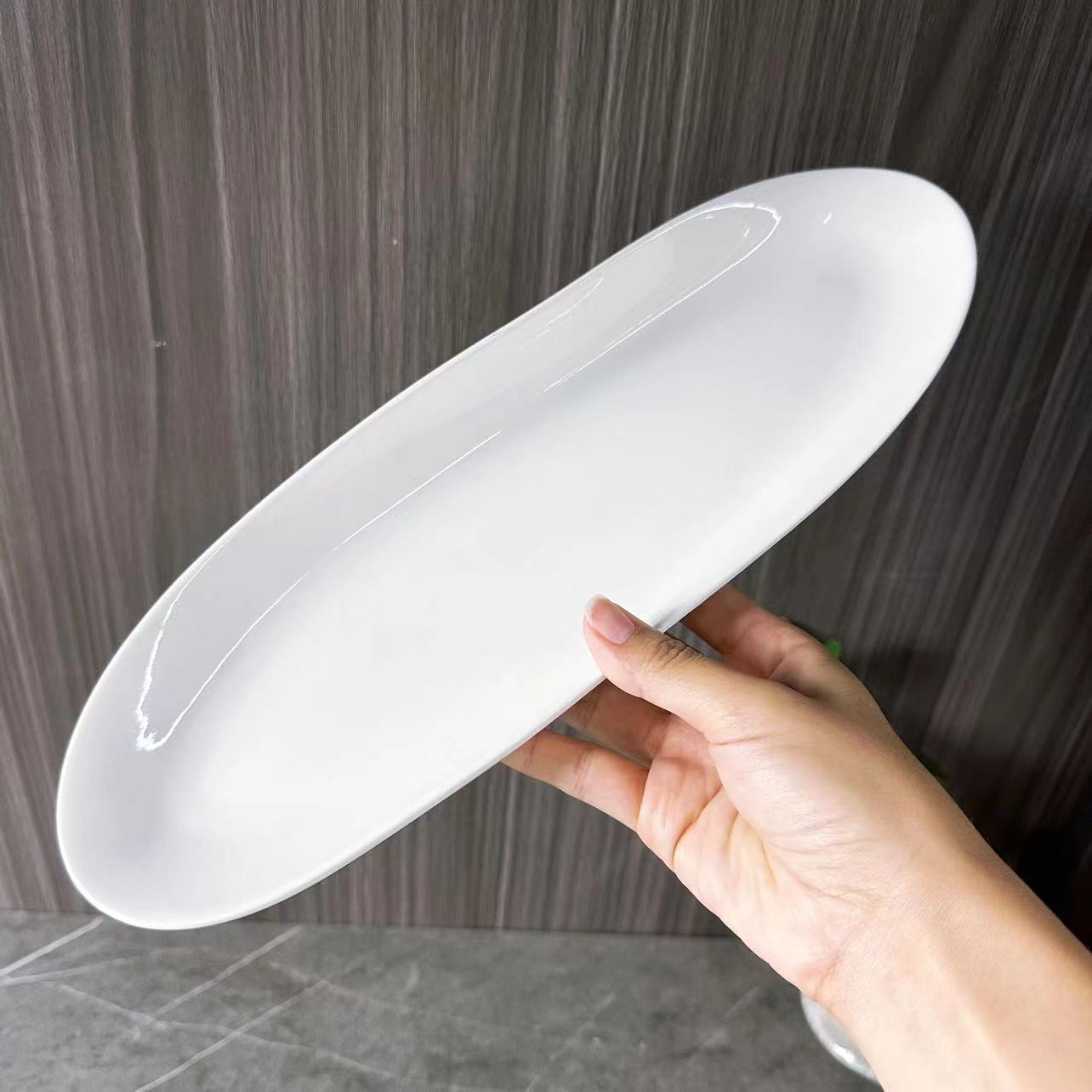 Classic white porcelain long strip plate, tongue-shaped plate, 13-inch and 15-inch creative design plate, suitable for hotel and restaurant use Application Scenario