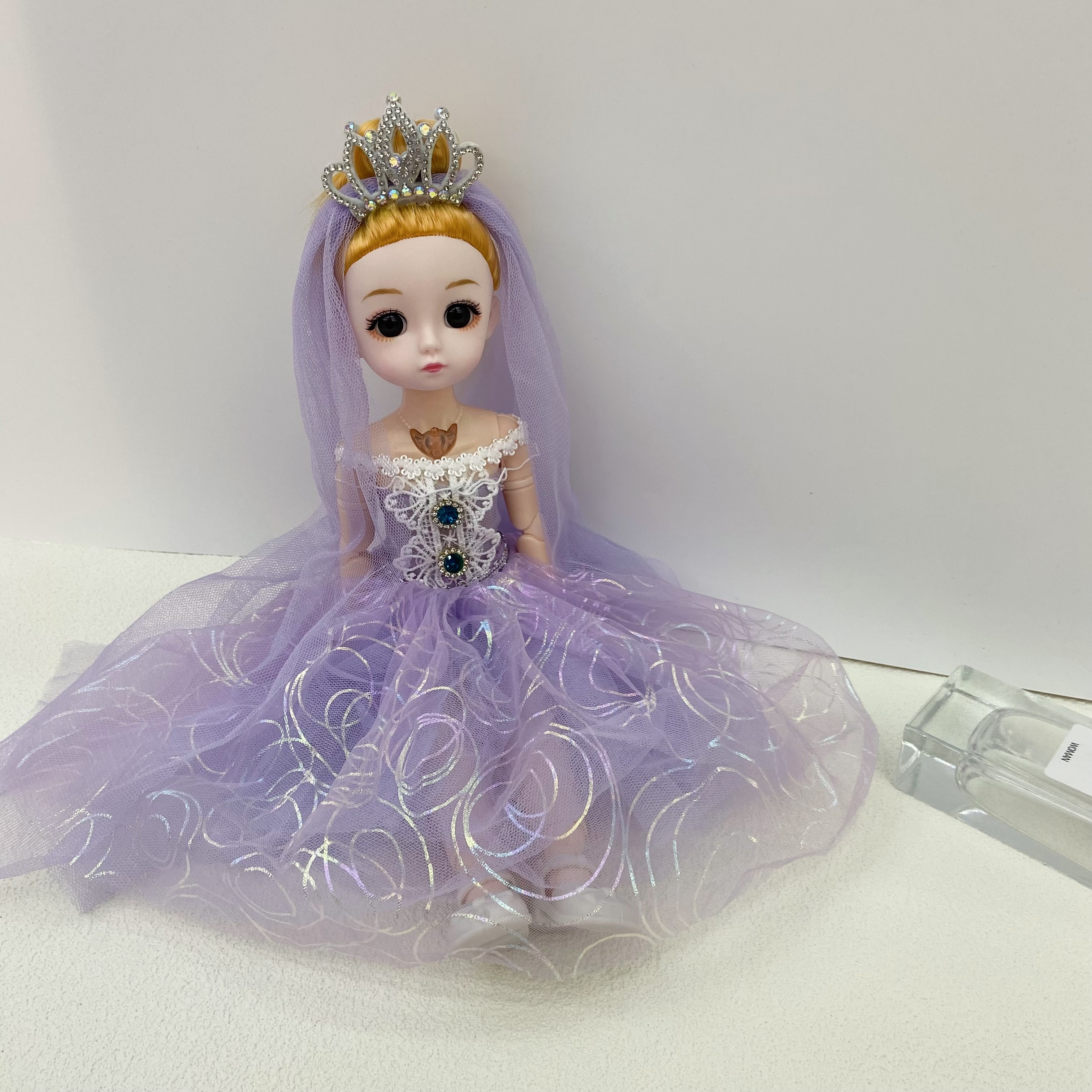 A 30CM rubber ball wedding dress Barbie with music and lights Application Scenario