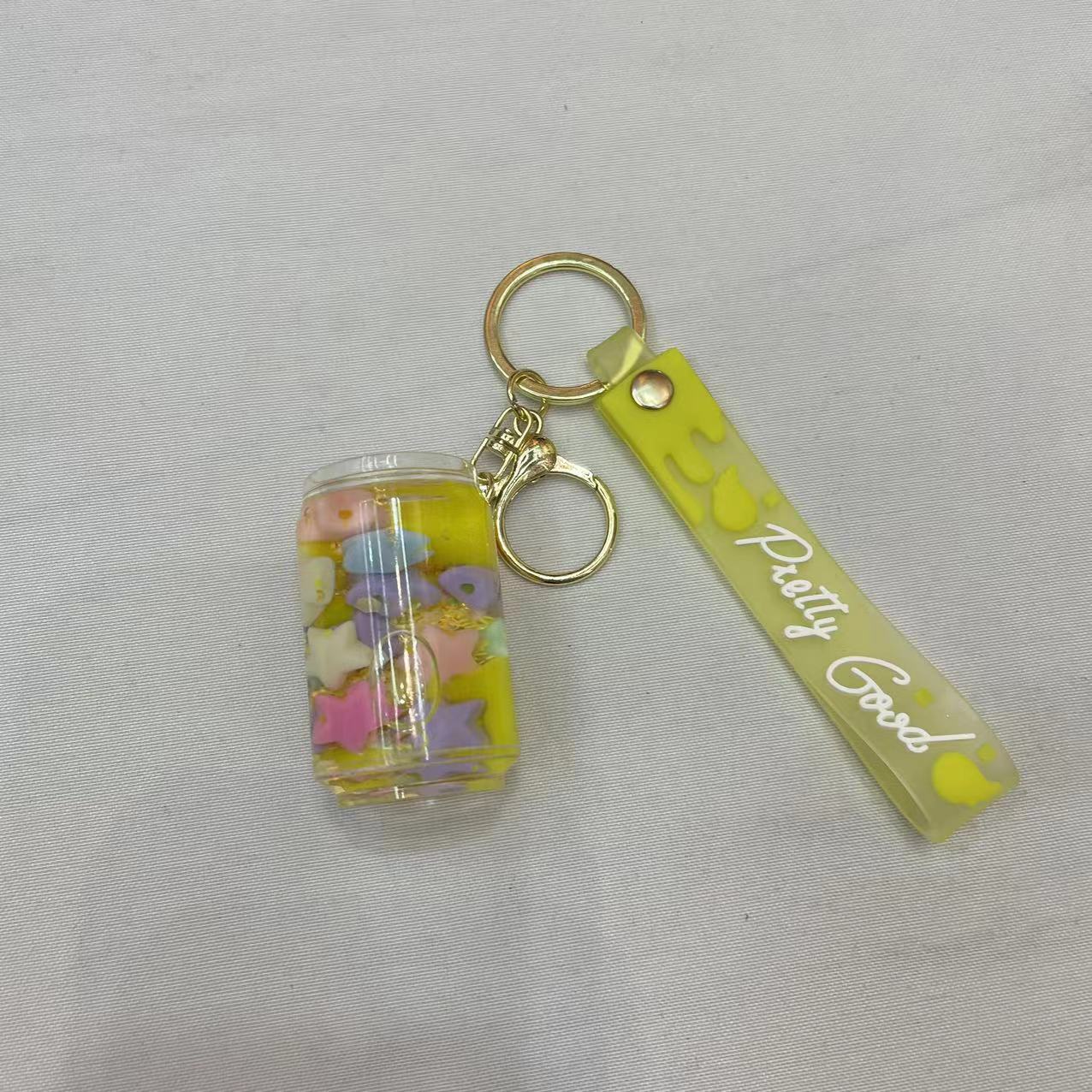 Creative bottle oil keychain, exquisite and cute, floating sand bottle, schoolbag pendant, decoration, car key pendant Specification image