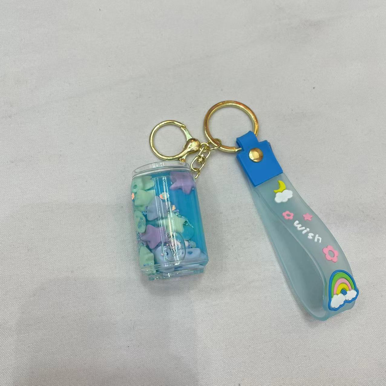 Creative bottle oil keychain, exquisite and cute, floating sand bottle, schoolbag pendant, decoration, car key pendant Application Scenario
