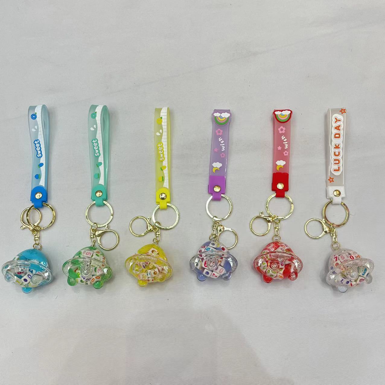 Creative aircraft oil filling keychain, exquisite and cute quicksand floating bottle, schoolbag pendant accessory, car key pendant