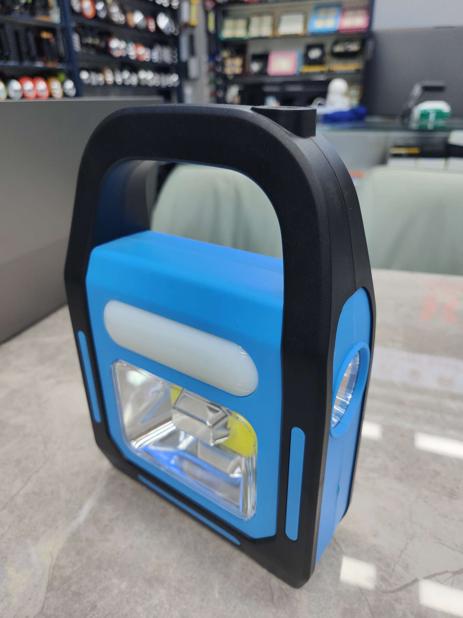 Solar-powered portable lamp