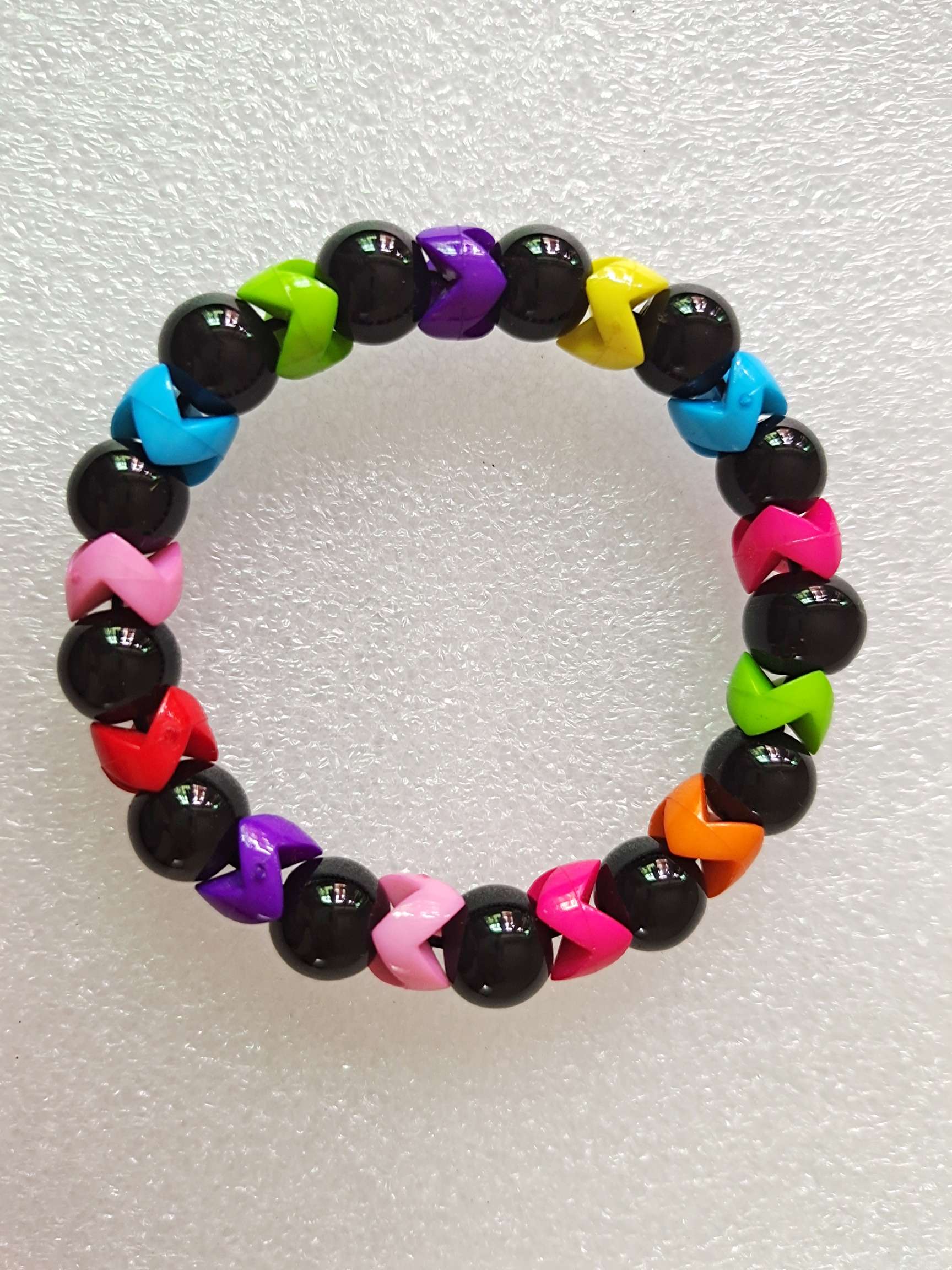 Creativo hot sale negro bead color pieza mano brocheta
