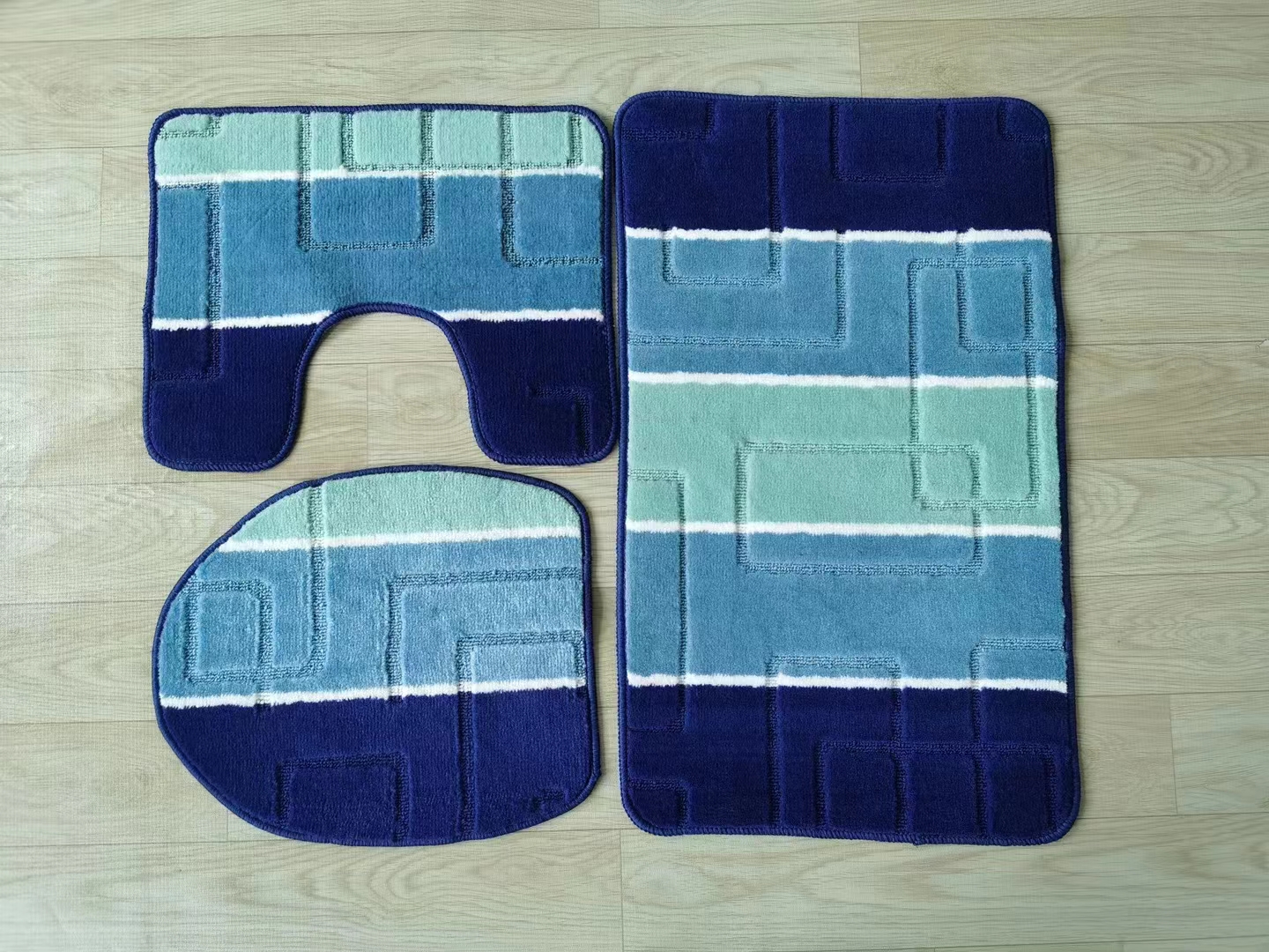 The bottom material of the polyester jacquard floor mat is TPR, and the fabric is the 50*80Cm series of polypropylene Item Picture