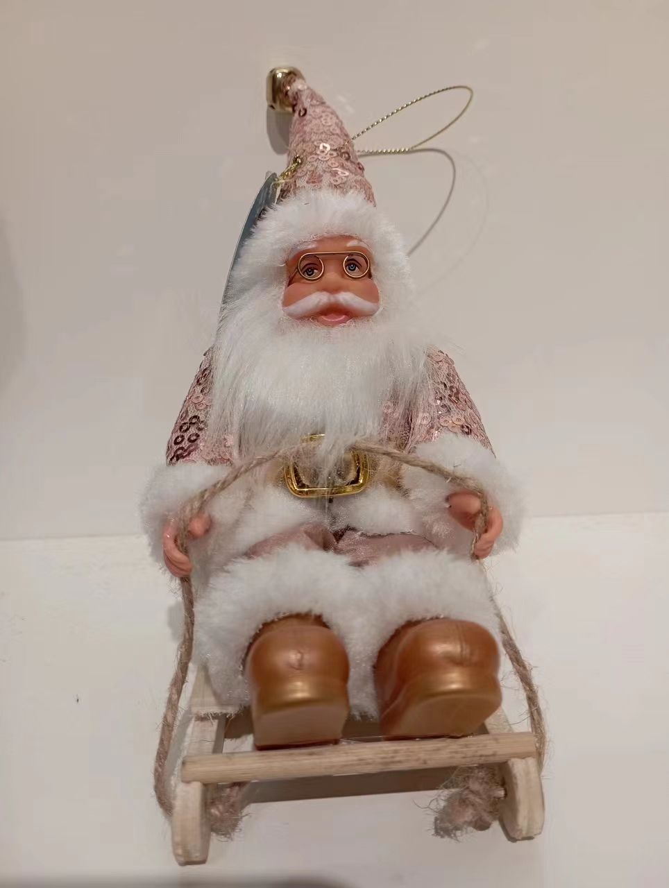 Christmas ornaments, static skiers in a sitting position, pink sequined clothes, room decoration, scene decoration