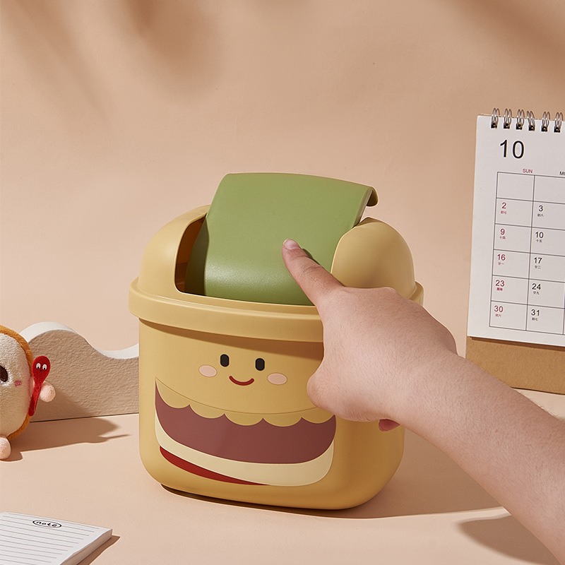 J06-6805 Covered Cartoon desktop Trash can, mini trash can, creative home living room small paper basket storage bucket, desktop small storage bucket, cartoon paper basket details Picture