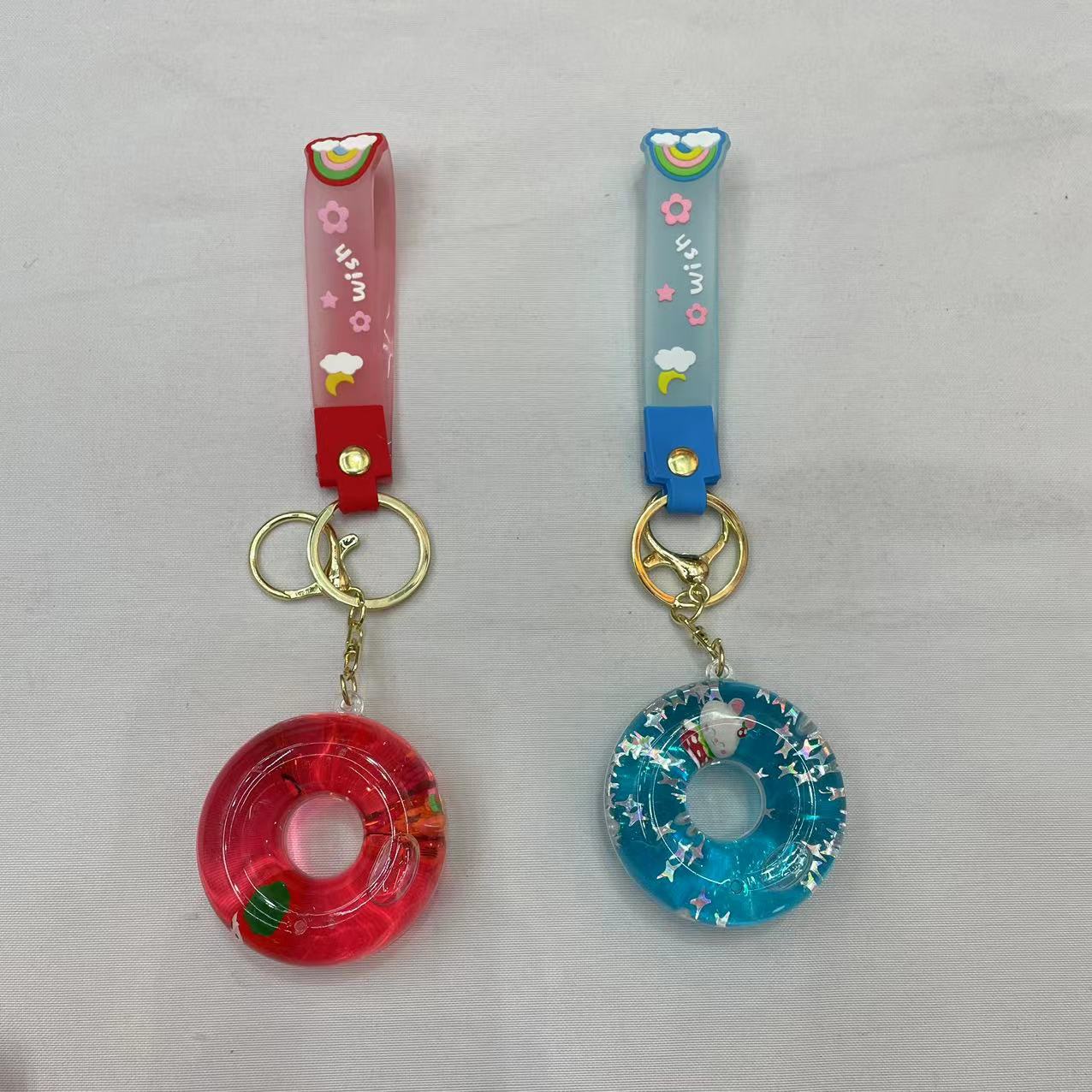 Creative doughnut oil keychain, exquisite and cute quicksand floating bottle, schoolbag pendant accessory, car key pendant Item Picture
