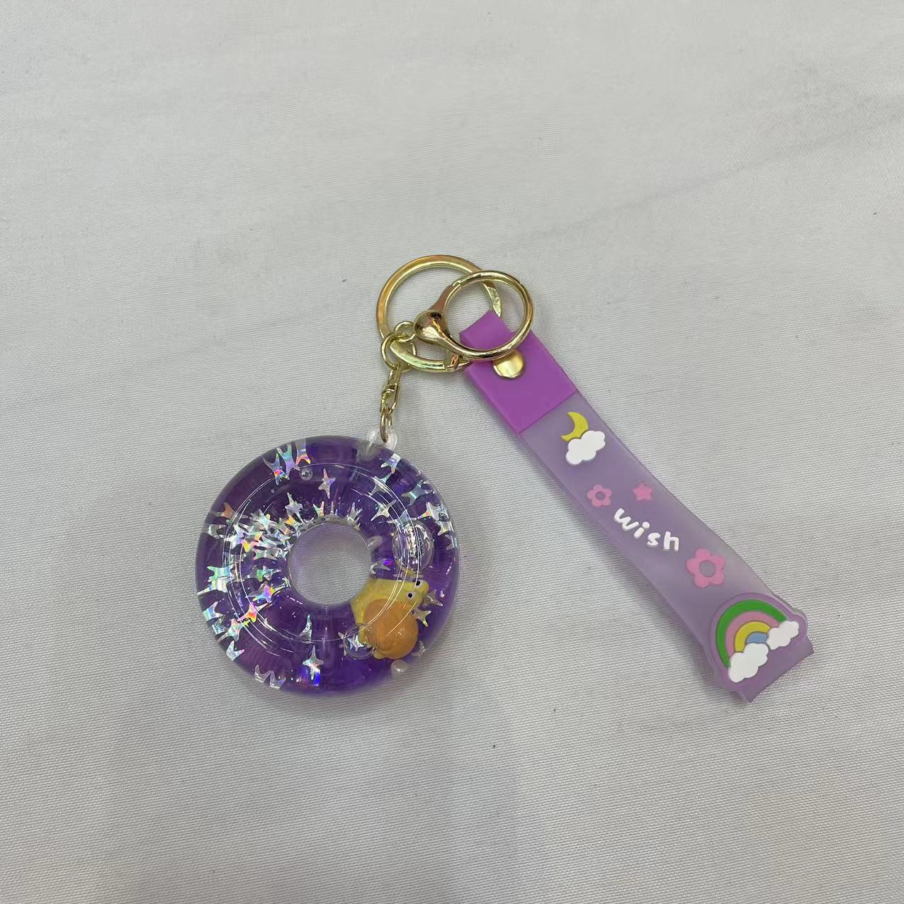 Creative doughnut oil keychain, exquisite and cute quicksand floating bottle, schoolbag pendant accessory, car key pendant details Picture