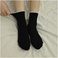 黑色简约纯色袜子长袜女复古堆堆袜欧美运动休闲中筒袜图