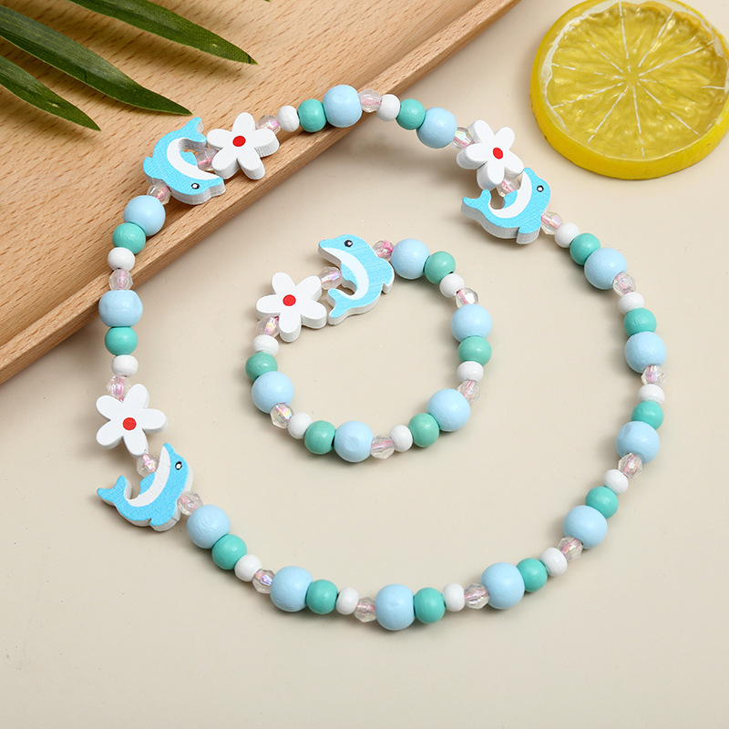 Blue Dolphin Creative New Children's Accessories Cartoon Animal Bracelet Bracelet Necklace Set Color Bead Set Wholesale Manufacturers Application Scenario