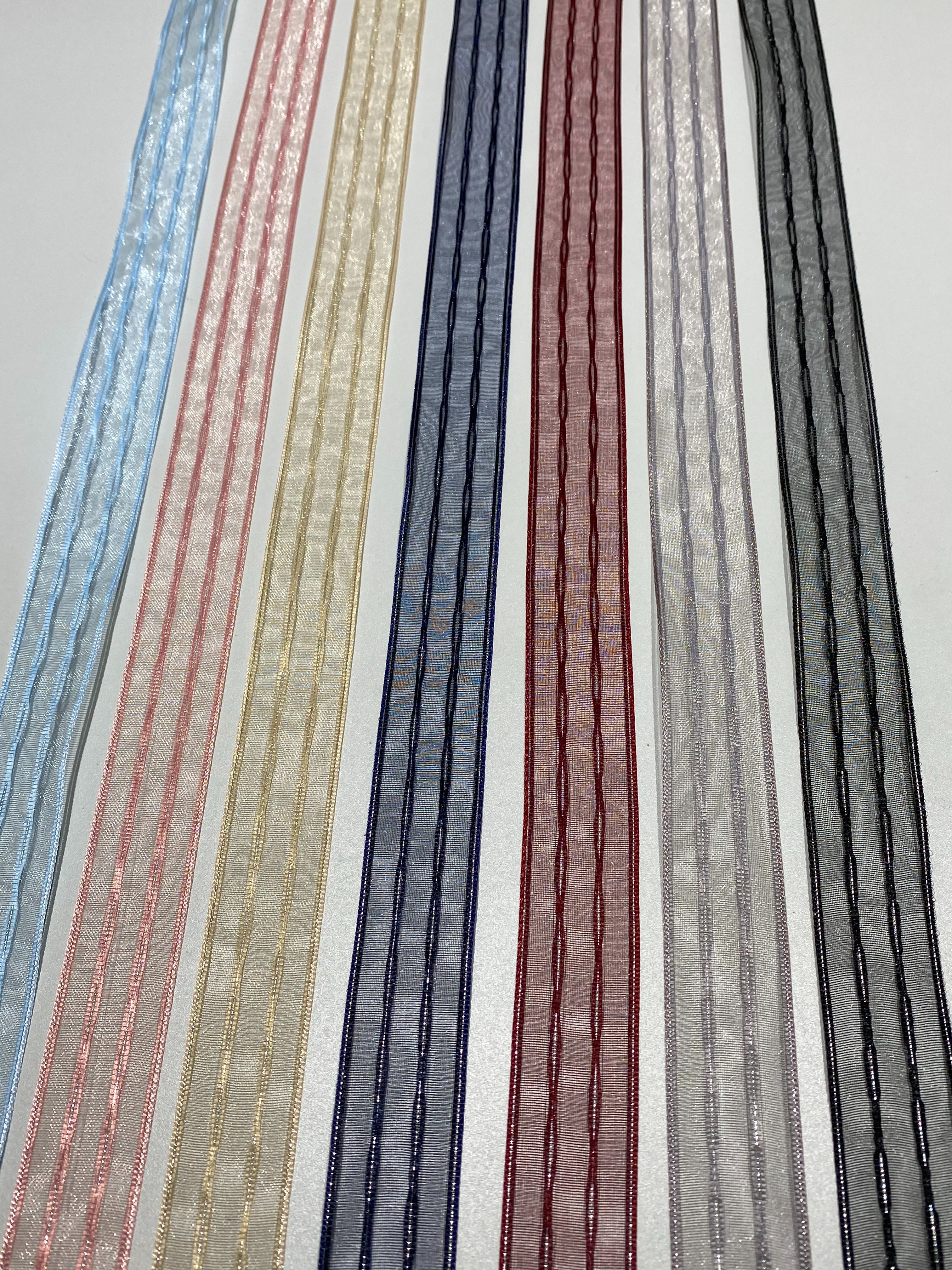 Take a look at the classic thick striped silver silk ribbon as a fashionable accessory