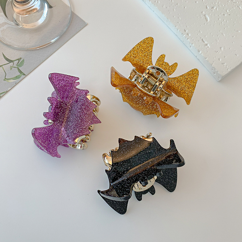 A new black cross-border best-selling mid-sized bat alloy style hair clip, which can be used to tie up the back of the head details Picture