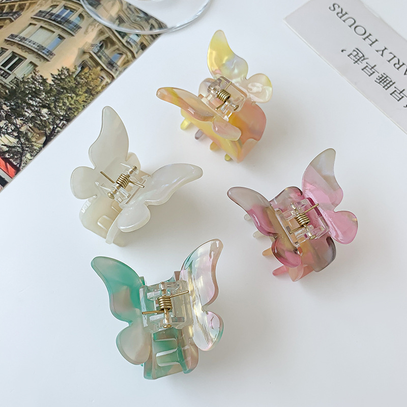 Pink butterfly fairy Ins-style Internet celebrity headwear, super fairy-like hair clip, butterfly-shaped acetic acid texture grab clip at the back of the head, gentle hair accessory Application Scenario