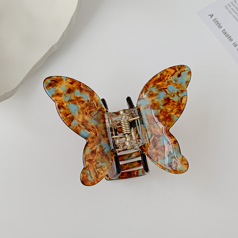New Korean-style black and white acetate hair clip with a butterfly-shaped acetate board at the back of the head, a hair accessory for women Item Picture
