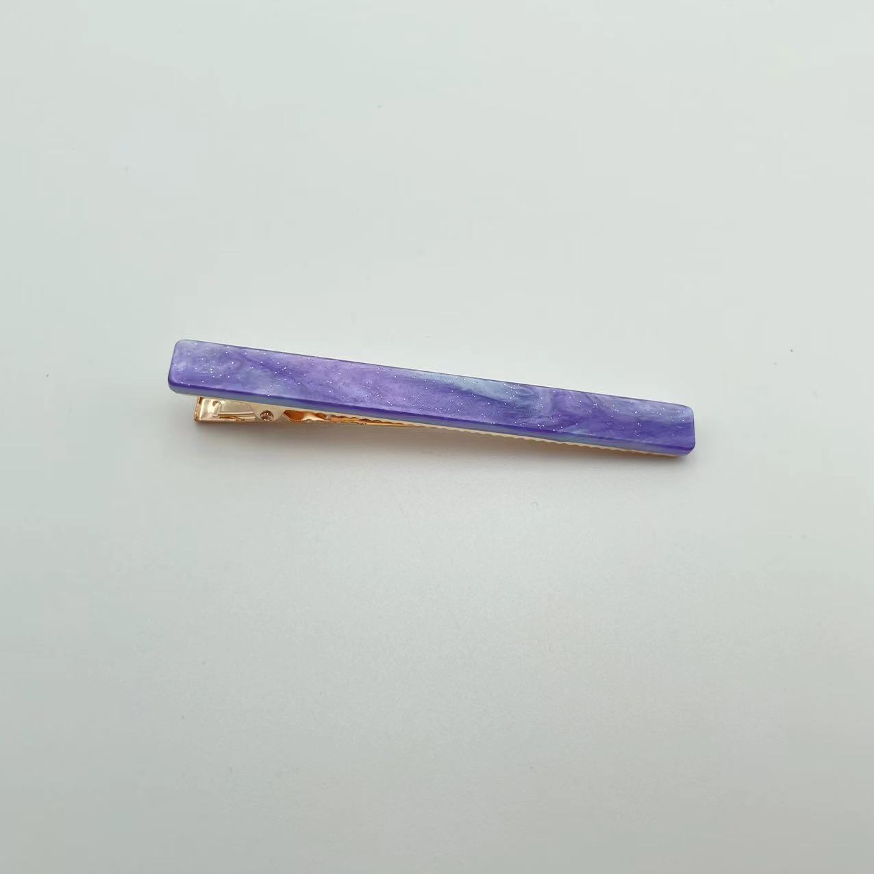 Galaxy Purple, a new stylish acetate hair clip from Dongdaemun, South Korea, features a simple and fashionable one-piece clip and a long duckbill clip