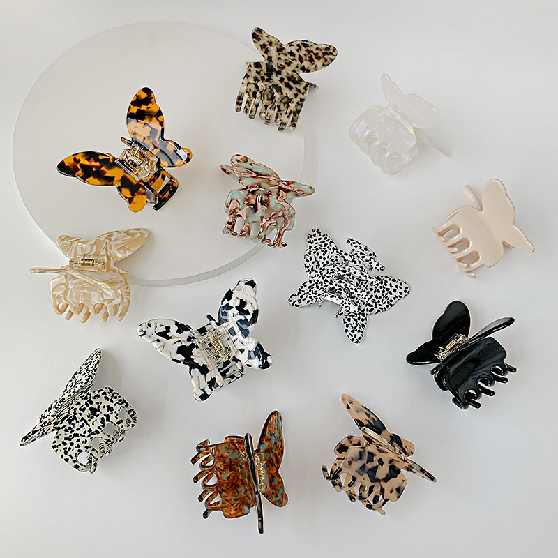 New Korean-style black and white acetate hair clip with a butterfly-shaped acetate board at the back of the head, a hair accessory for women Application Scenario