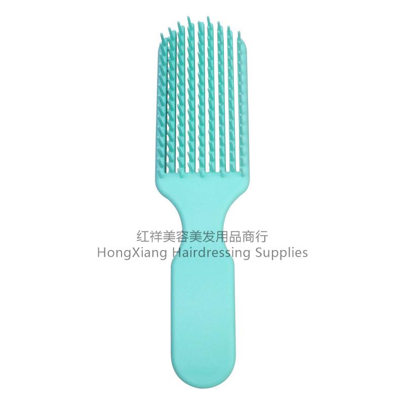 家用九爪梳子/女生顺发弹性塑料梳/美发工具厂家批发/九排头部按摩梳白底实物图
