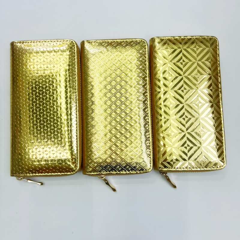 Venta directa de fábrica de yiwu billetera de oro caliente en relieve bolsa de mano de gran capacidad bolsa de pull simple de alta calidad bolsa de mujer vintage de europa y américa regalo de halloween navidad regalo de mercancías de bajo precio