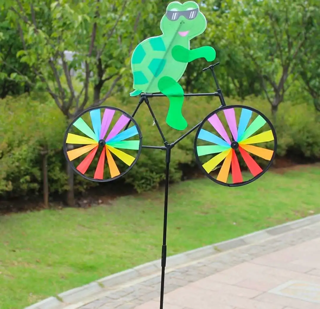 The street stall is selling popular three-dimensional bee, bike, animal, fabric windmill decorations, outdoor courtyard, and rotating children's toys detail image 2