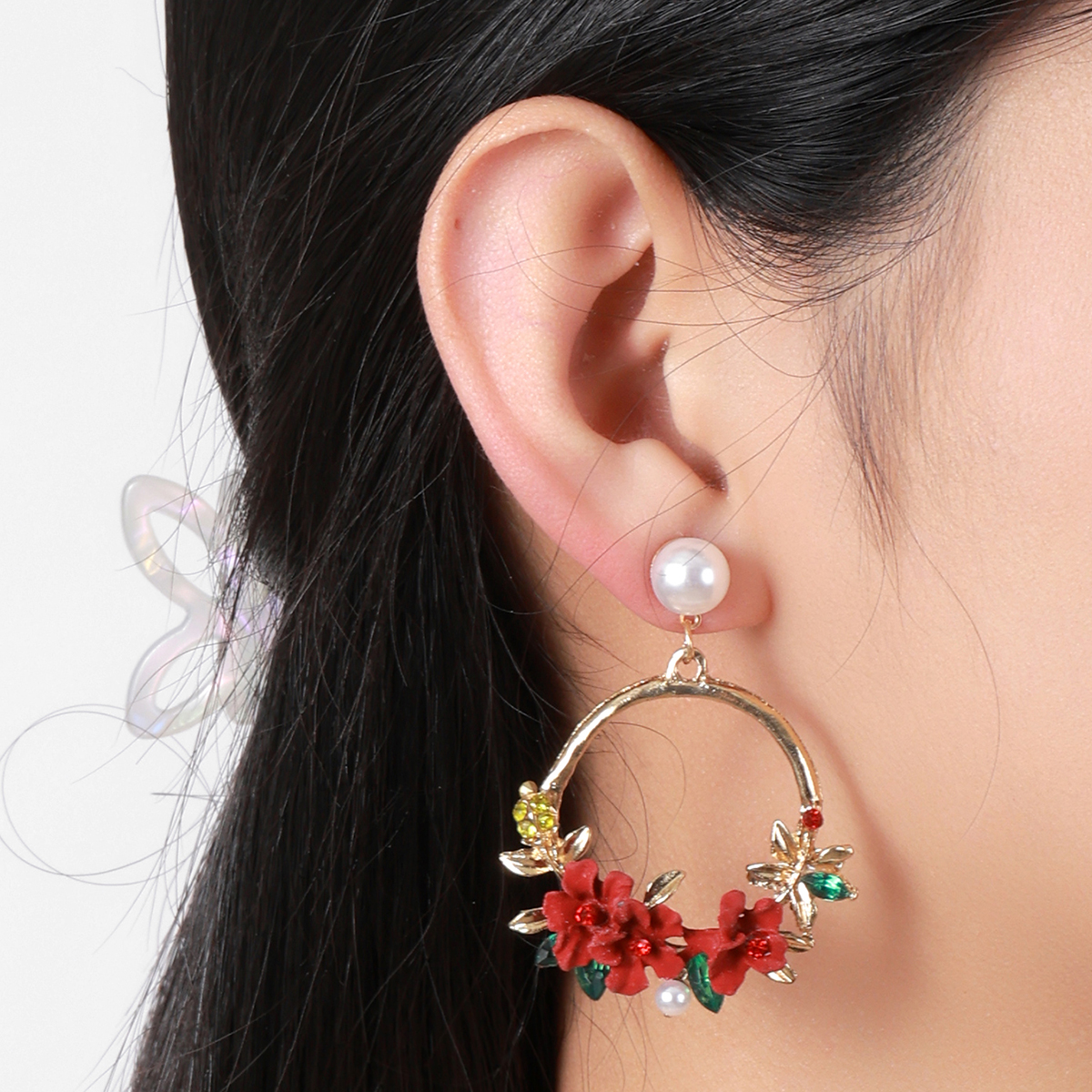 The sweet soft clay pearl women's stud earrings with the same flower-shaped design as the Korean Instagram influencer are a bestseller on AliExpress