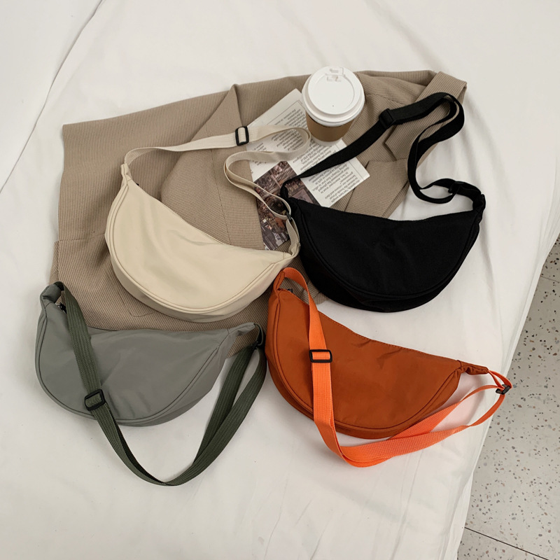Nylon crossbody bag female fashion dumpling bag lightweight small crossbody bag underarm bag simple single shoulder canvas bag 28 details Picture