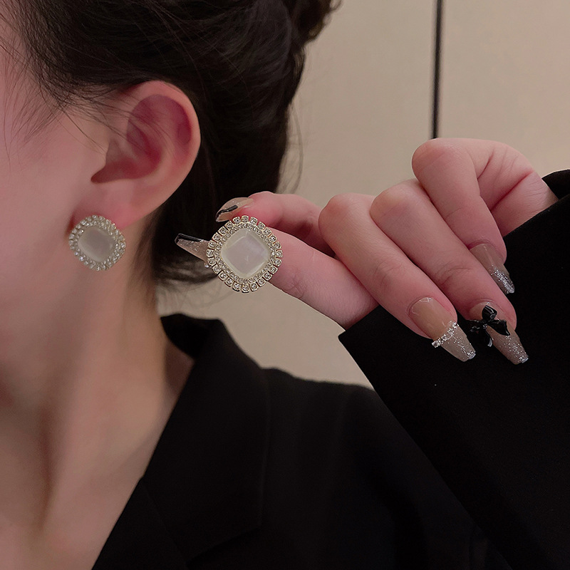 925 Silver Needle light luxury senior design sense cat's eye square earrings ins style small diamond studded super flash earrings Application Scenario
