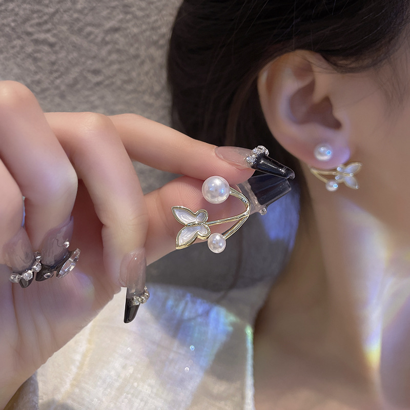 S925 Silver needle light luxury advanced design sense dripping oil bow earrings female ins trend network red the same pearl earrings details Picture