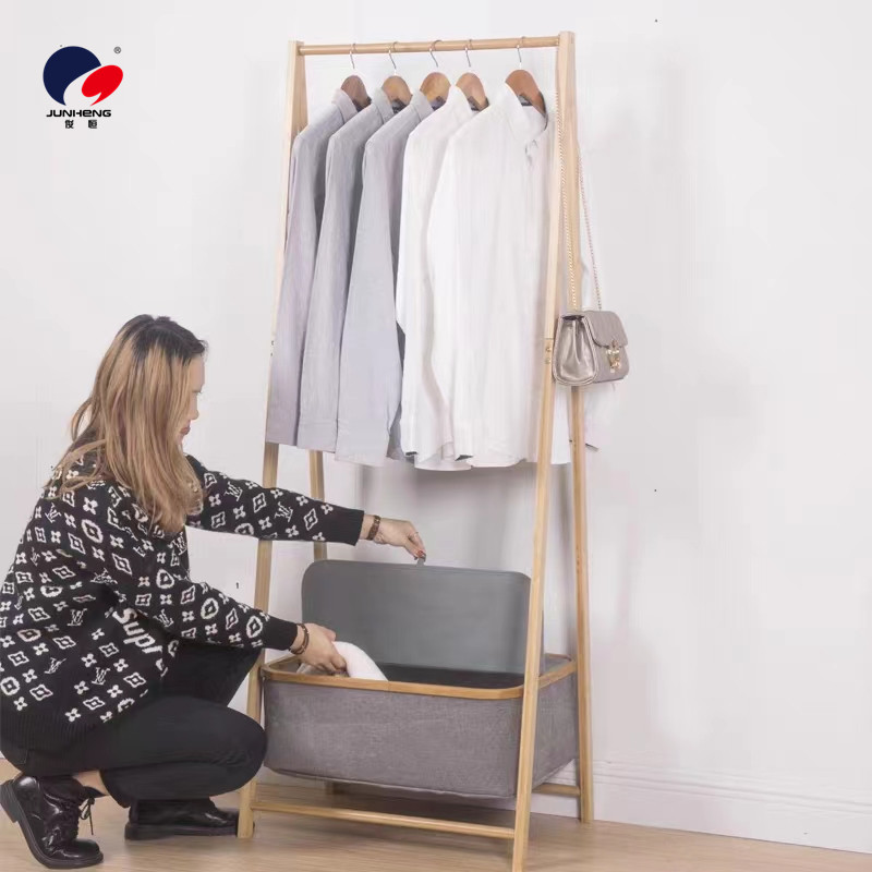 Floor-standing clothes drying rack, bedroom hanging rack, modern internet-famous household coat rack, simple balcony storage rack details Picture