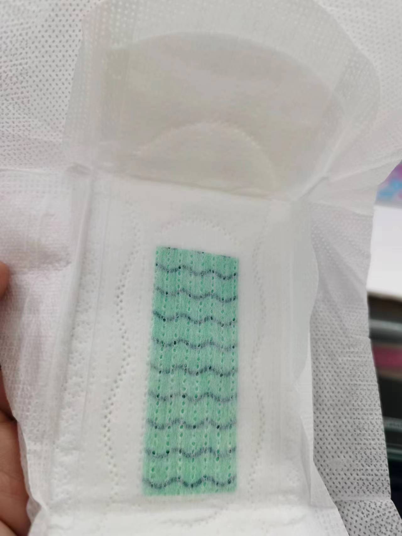 Nanu Night Use 300Mm Negative Ion Sanitary Napkin Light Instant Suction Dry Breathable Cotton Soft Skin Comfortable Menstrual Towel Whole Box Batch Application Scenario