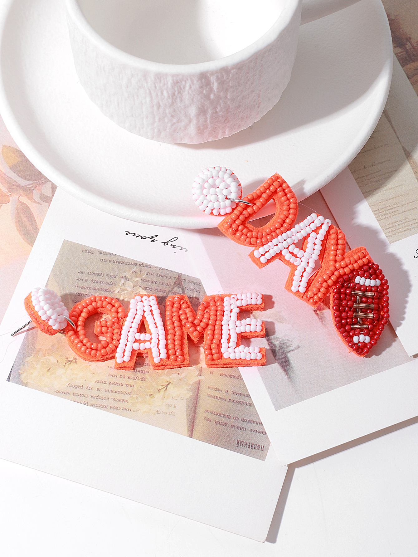 European and American cross-border sporty style fashionable commuting fabric pure handcrafted rice beads English letter autumn and winter women's earrings