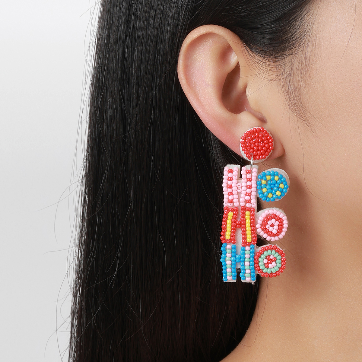 European and American cross-border handcrafted fabric rice beads Christmas HO letter fashion and creative fashion commuting ladies' earrings details Picture