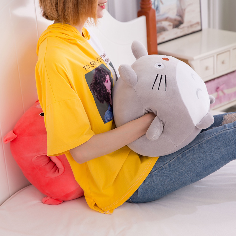 Cartoon warm hand pillow plush toy, a cute winter girl's office nap pillow doll Application Scenario