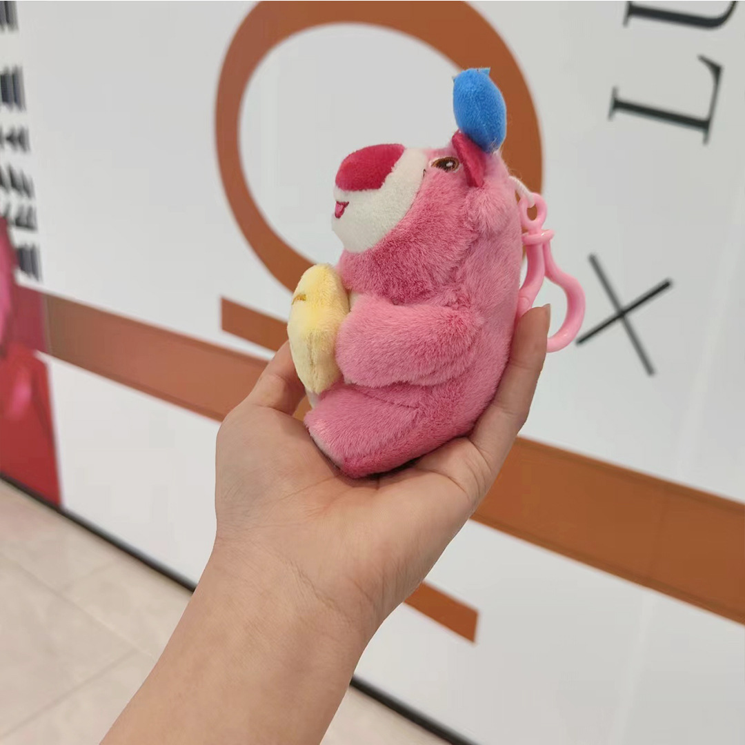 Wholesale of cute strawberry bear plush toy dolls with cute hugging postures Application Scenario