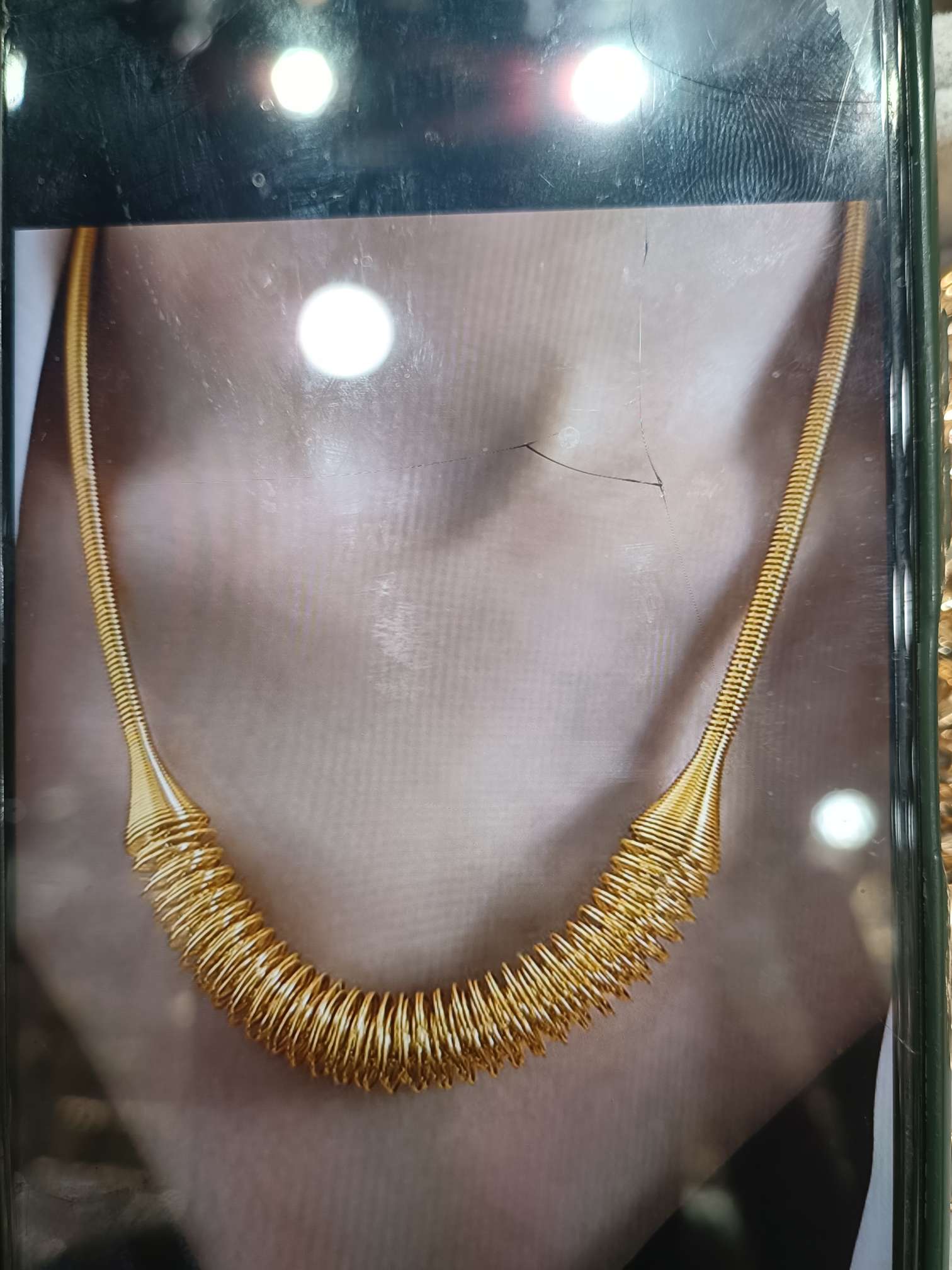 Golden exaggerated spring collar
