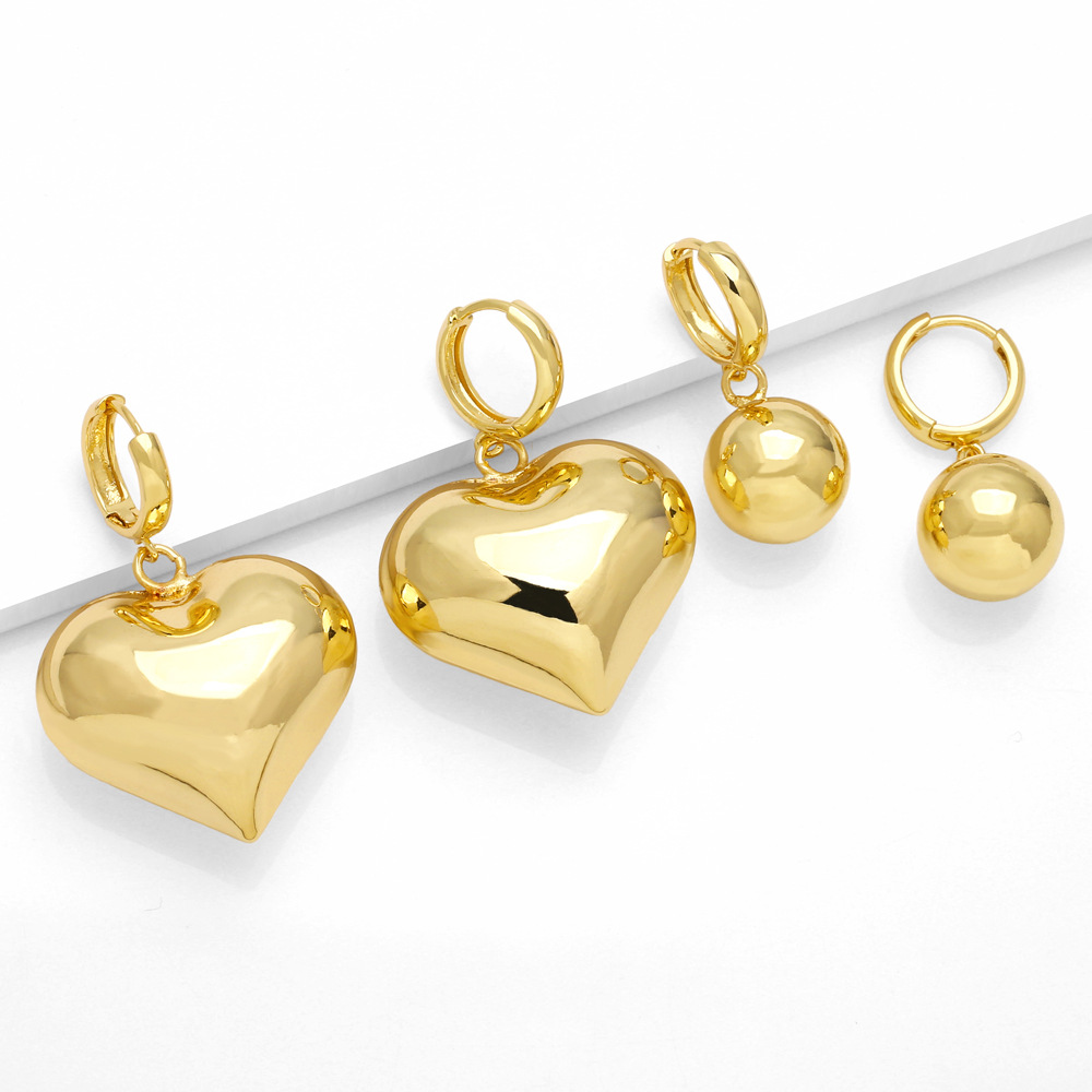 New simple heart-shaped pendant earrings from Europe and America, personalized and creative, versatile gold-plated ear rings and earrings for women detail image 7