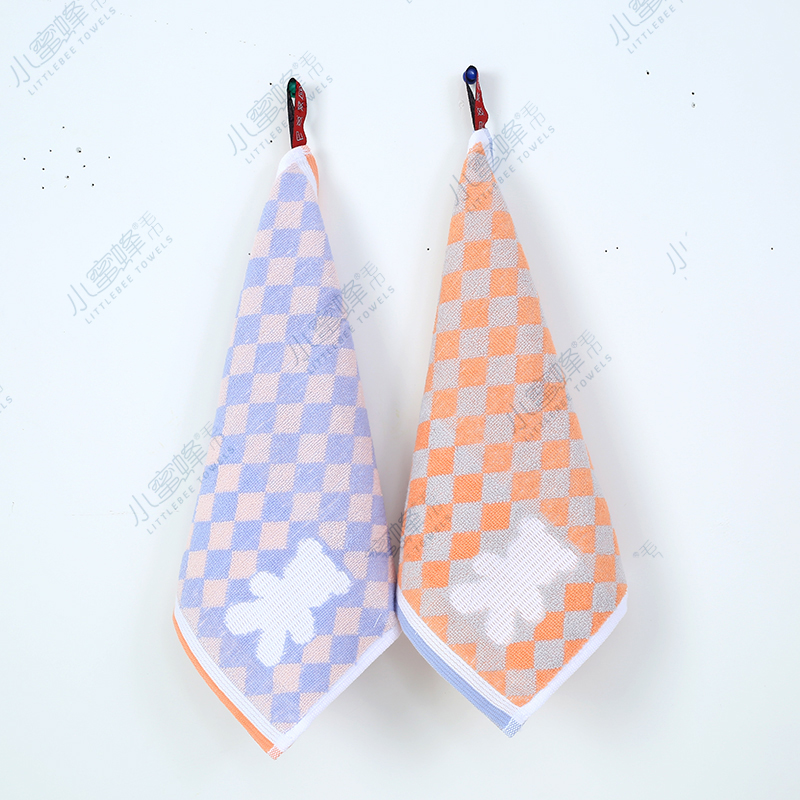 One-piece consignment cartoon jacquard towel factory direct sales multi-color ribbon hook towel. Product number: 103