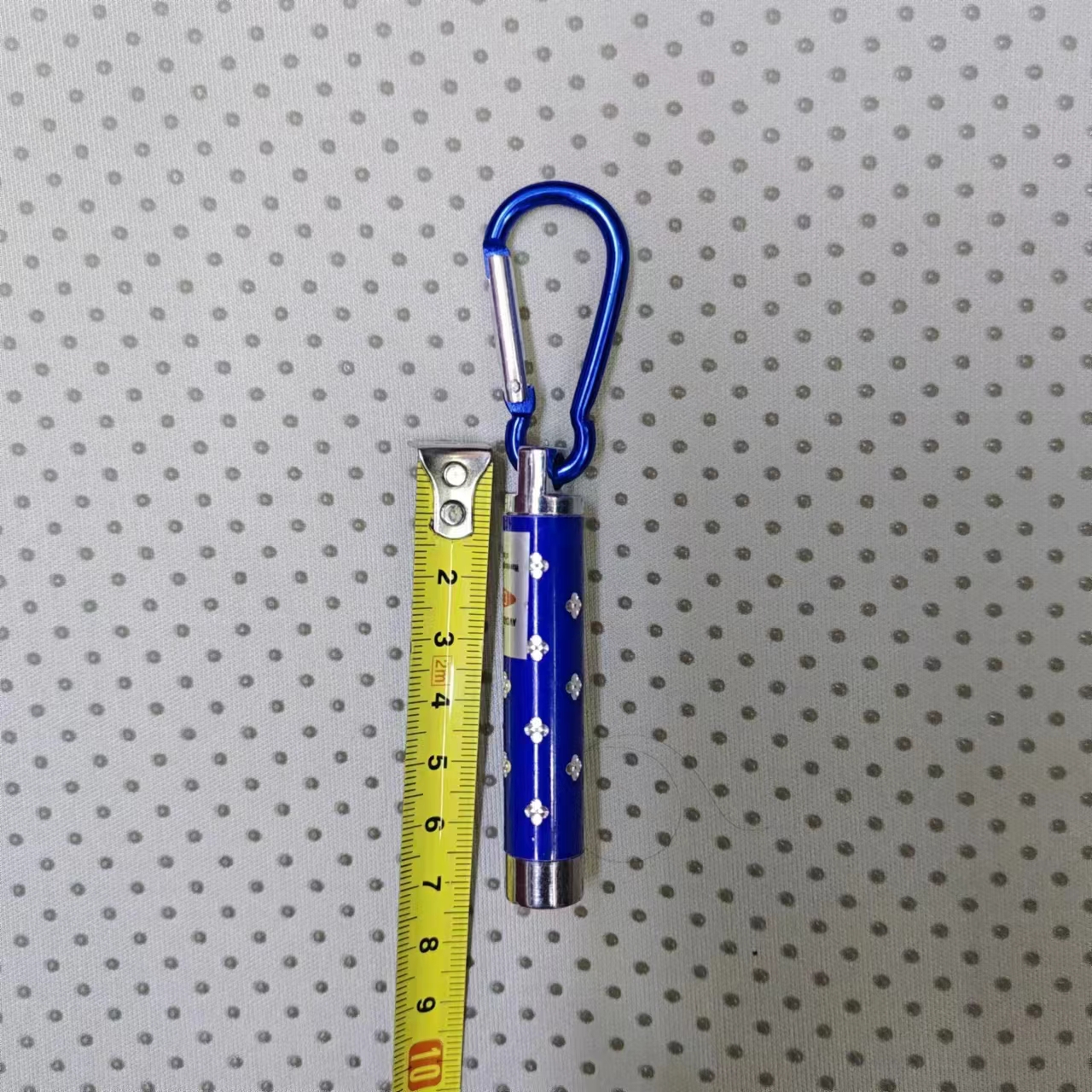Wholesale of banknote detector lights, laser beams, flashlights, plum blossom poles, flat heads, three-in-one led, practical gifts, 5-yuan store, manufacturer wholesale Application Scenario
