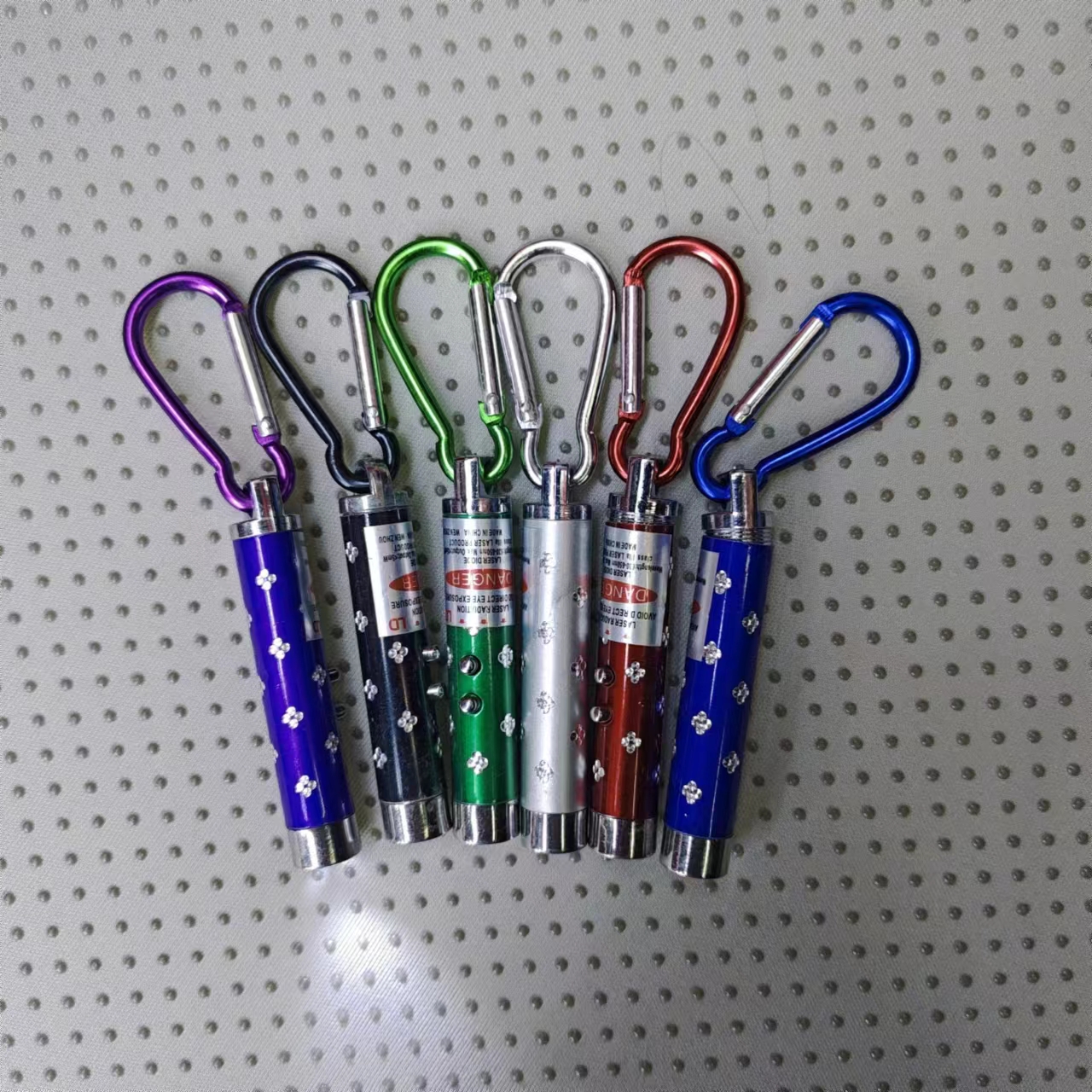 Wholesale of banknote detector lights, laser beams, flashlights, plum blossom poles, flat heads, three-in-one led, practical gifts, 5-yuan store, manufacturer wholesale Item Picture