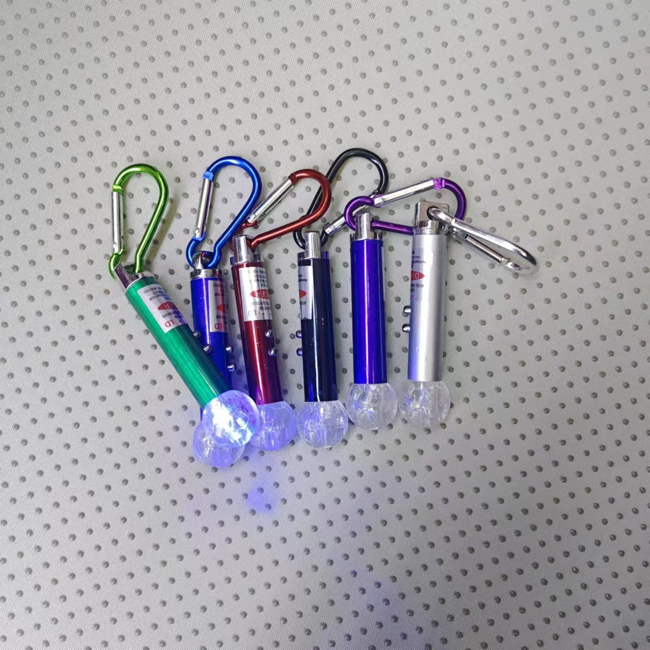 Laser flashlight, football seven-color light, led wholesale, practical gifts, 5-yuan store, children's luminous toys, direct sales from Gao Gao Electronics Specification image
