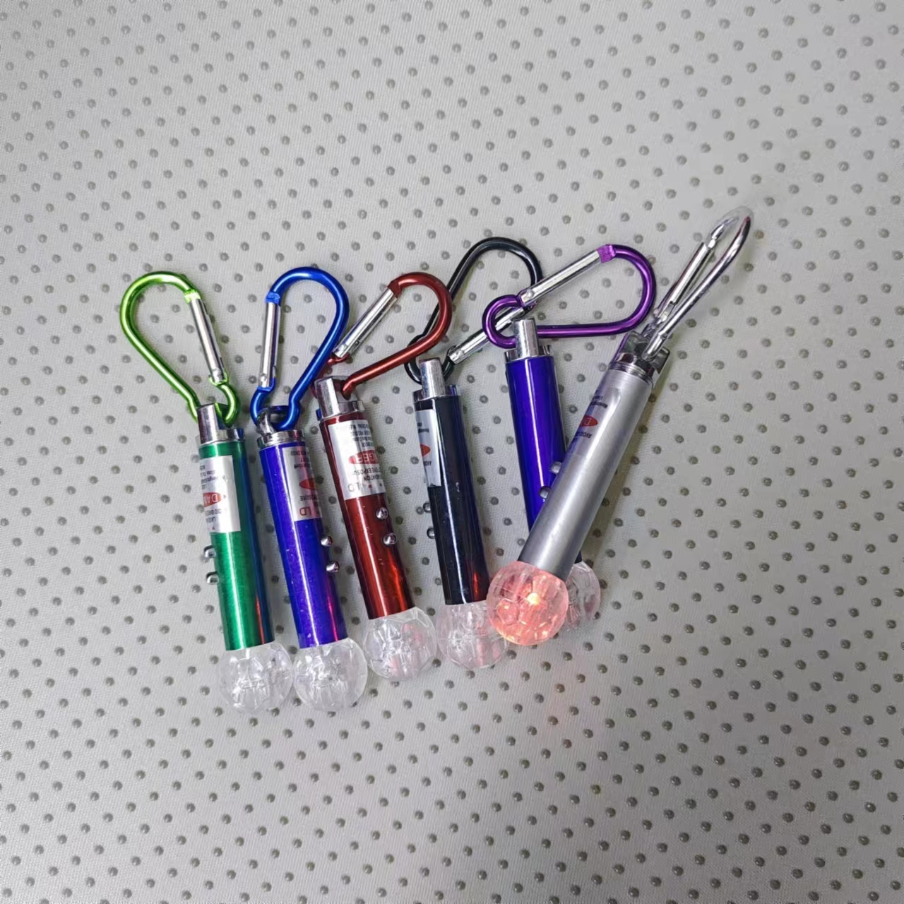 Laser flashlight, football seven-color light, led wholesale, practical gifts, 5-yuan store, children's luminous toys, direct sales from Gao Gao Electronics details Picture
