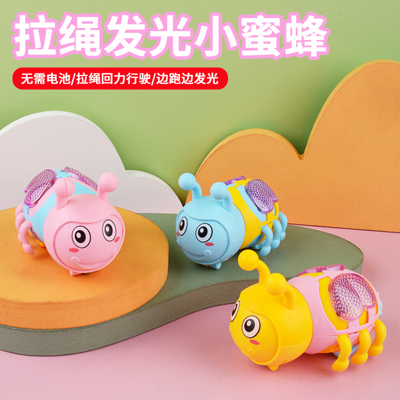 Wholesale supply of the popular children's educational and cute toys with drawstring resilience and glowing little bees from the factory, direct delivery