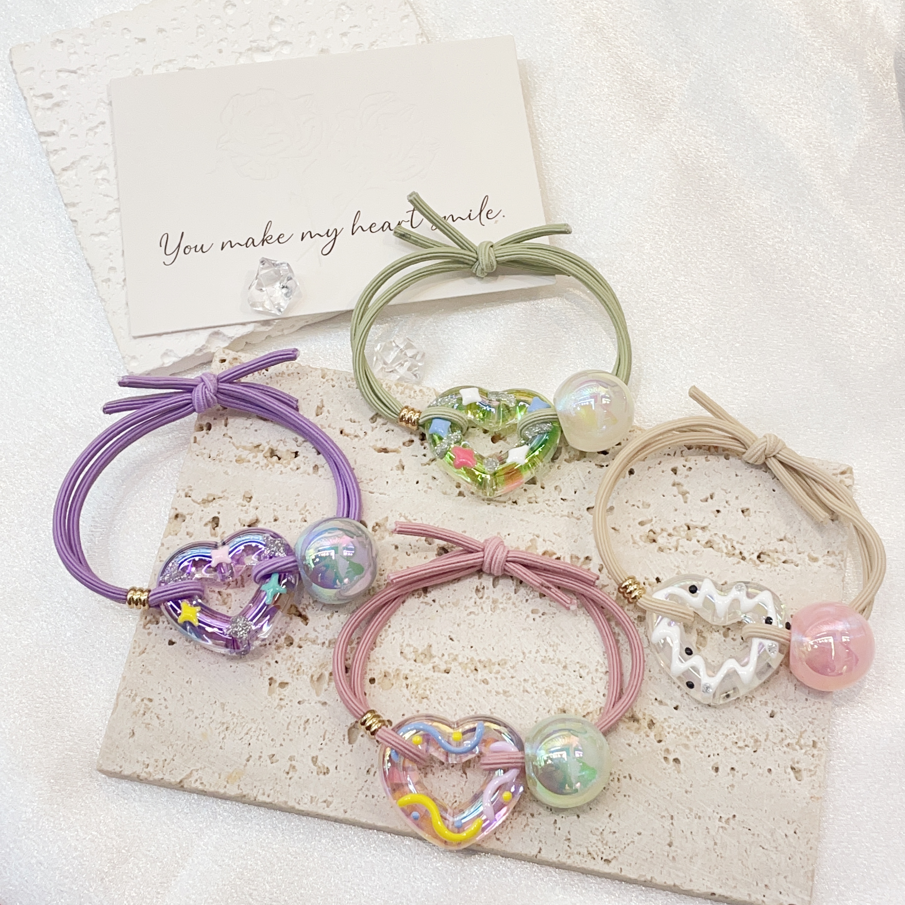 2024 New acrylic high-end and elegant gripper headwear, girls' hair accessories, colorful hair clips, exquisite translucent rubber bands, telephone lines Application Scenario
