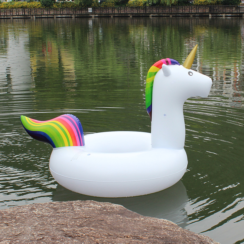 Children's swimming rings are selling well. 90cm unicorn inflatable toy PVC swimming rings, water play swimming rings Application Scenario