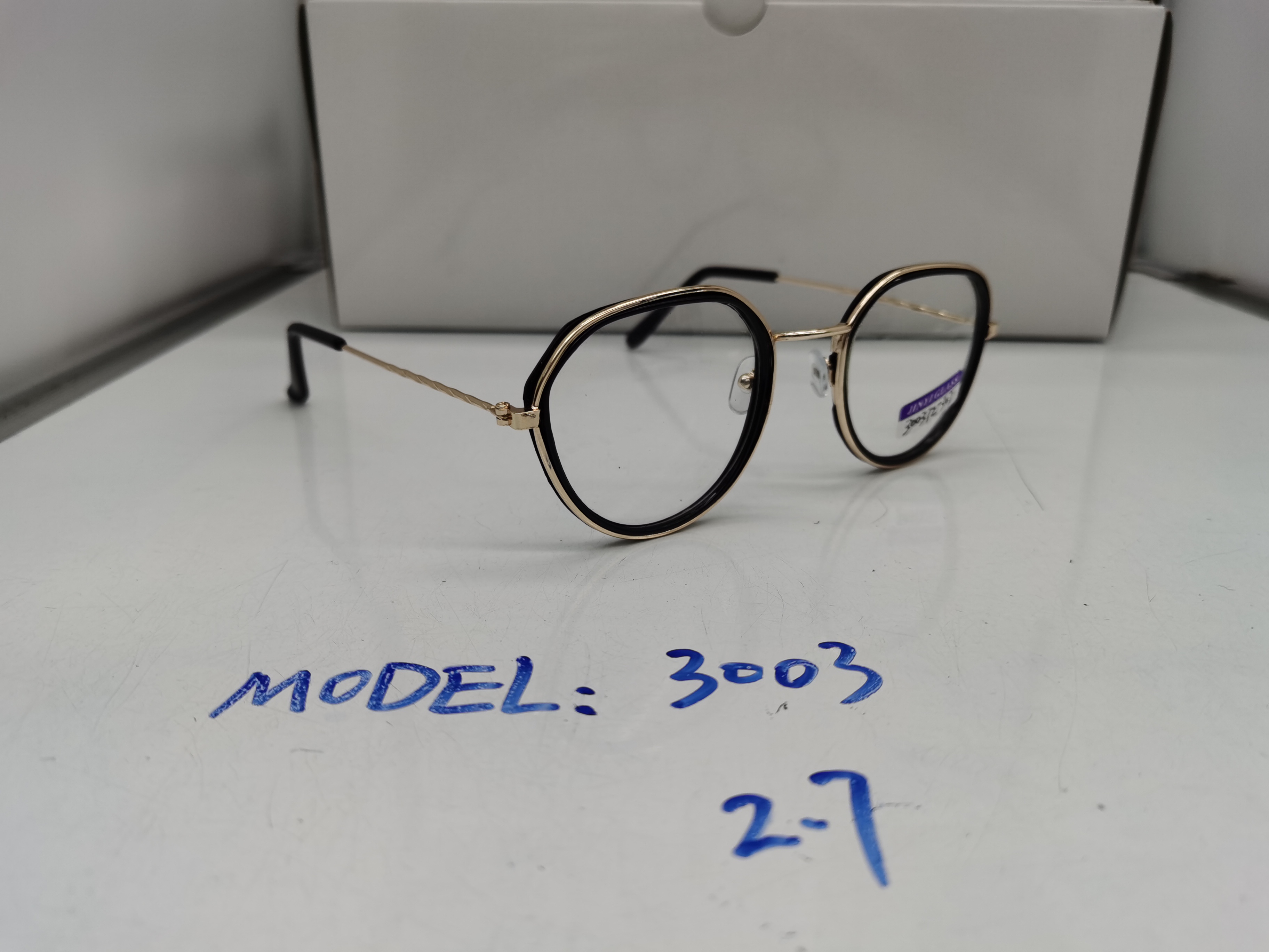 时尚黑色塑料圈金色金属框架不规则镜片光学眼镜详情图1