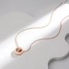 A simple, round, diamond-encrusted, rose gold-plated titanium steel collarbone women's water wave necklace with Roman numerals Application Scenario