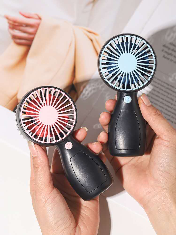 新款迷你手持小风扇 户外便携充电USB小型台式电扇学生桌面风扇白底实物图