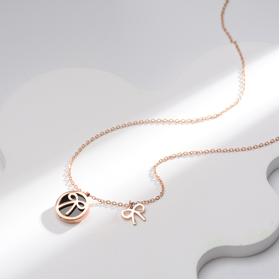 European and American fashionable black round bow necklace, titanium steel elegant collarbone chain, rose gold jewelry for women Application Scenario