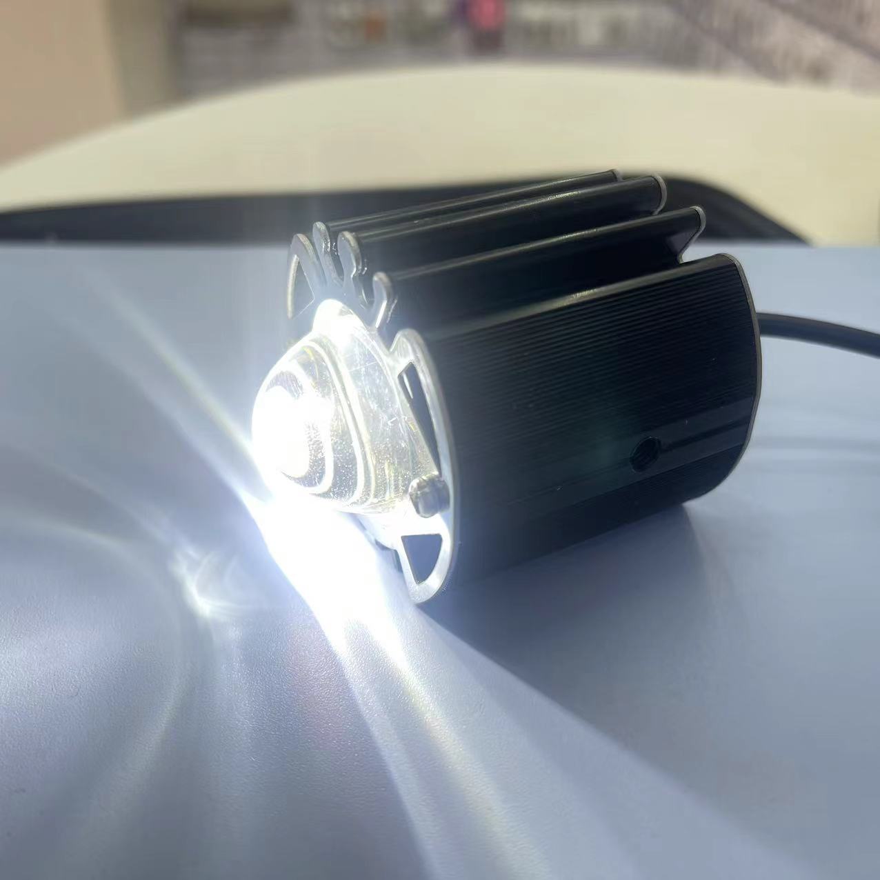 Small steel cannon LED spotlights, motorcycle headlights, yellow and white flashing lights, lens spotlights, export version Application Scenario