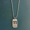 Cross-border foreign trade hollowed-out lucky number eleven keychain, brushed military brand titanium steel stainless steel necklace pendant Specification image